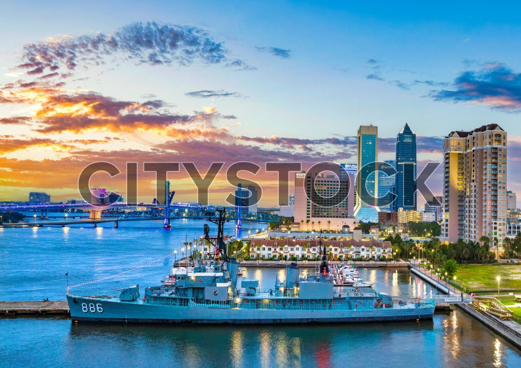 Jacksonville city skyline and naval ship at sunrise, Florida
