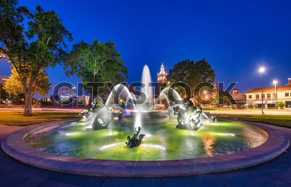 Evening view of illuminated fountain in Kansas City urban park