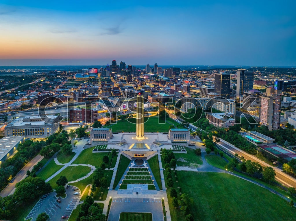 Panoramic aerial photo of Kansas City at sunset with city lights