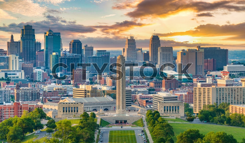 Aerial view of Kansas City skyline at sunrise with vibrant skies