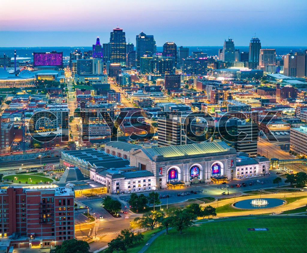 Aerial view of Kansas City at sunrise, featuring Union Station