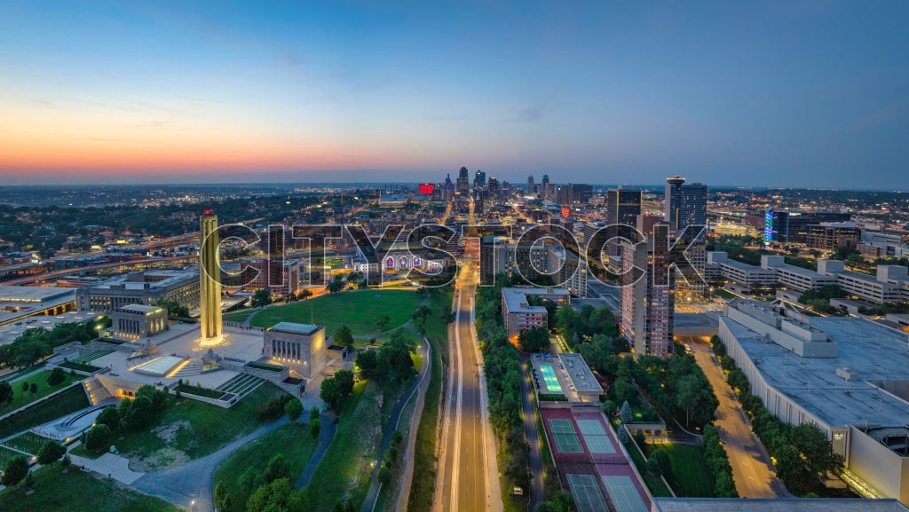 Aerial nighttime view showcasing Kansas City's illuminated skyline