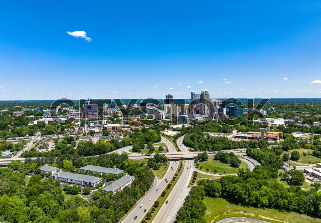 Aerial view of Raleigh, NC downtown skyline under blue sky