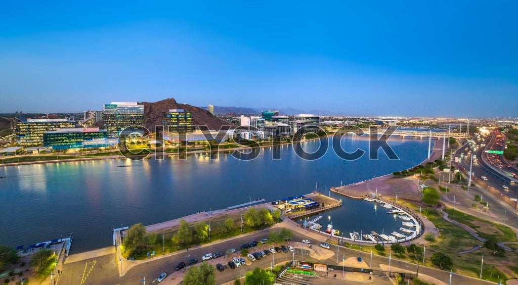 Aerial view of Tempe, Arizona at sunset with lake and cityscape