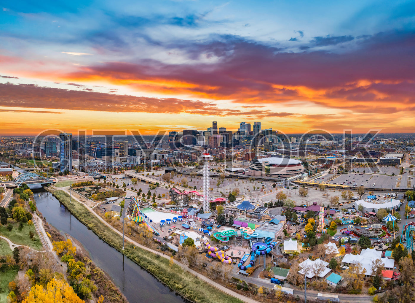 Aerial view of Denver skyline with South Platte River at sunset