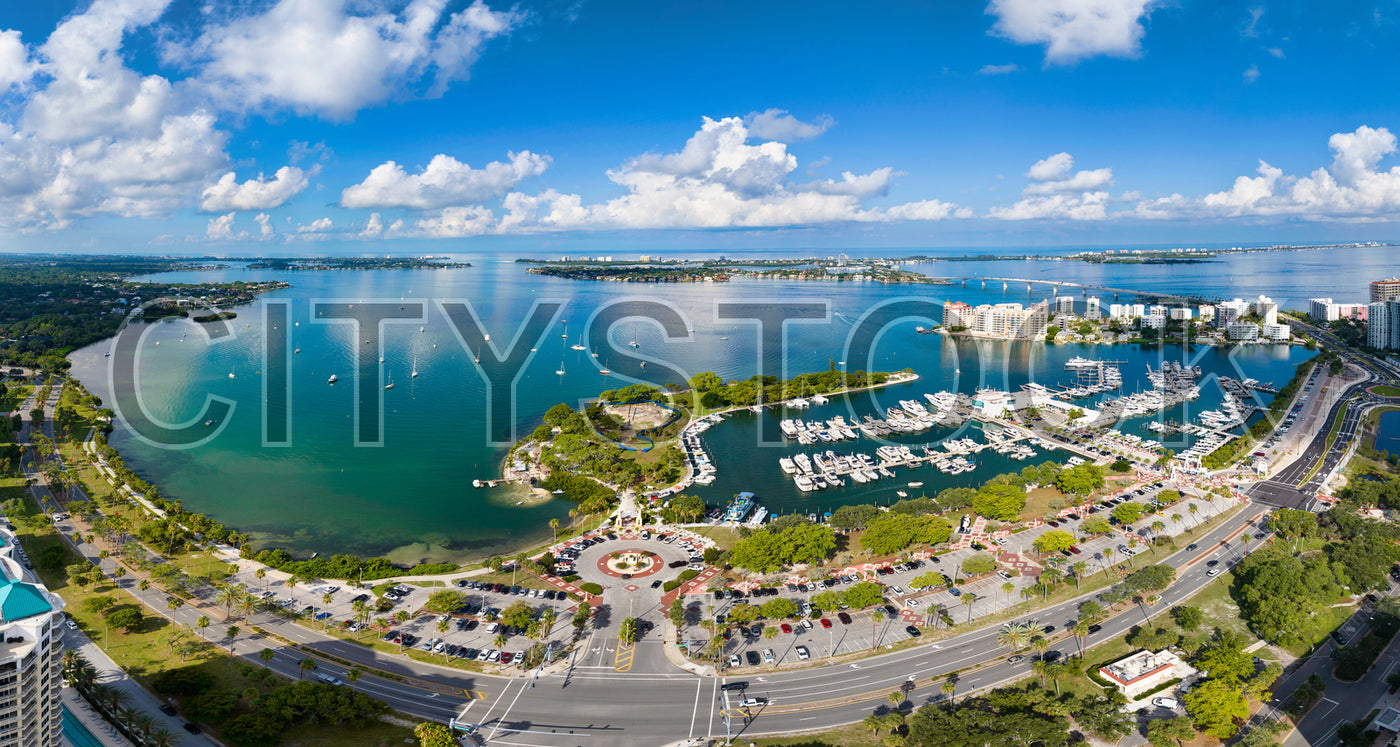 Aerial view of Sarasota Bay with marina full of yachts and boats