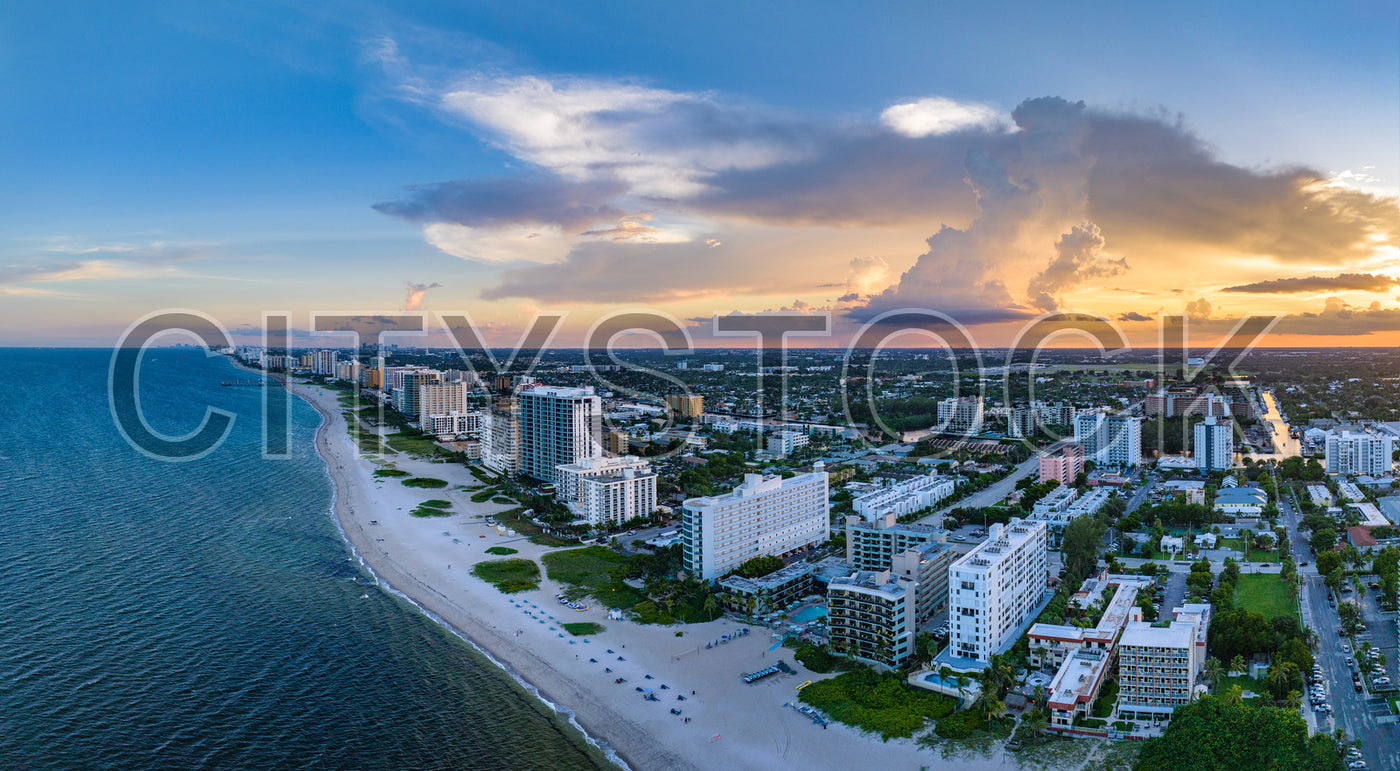 Aerial view of sunset at Deerfield Beach, Florida with vibrant cityscape
