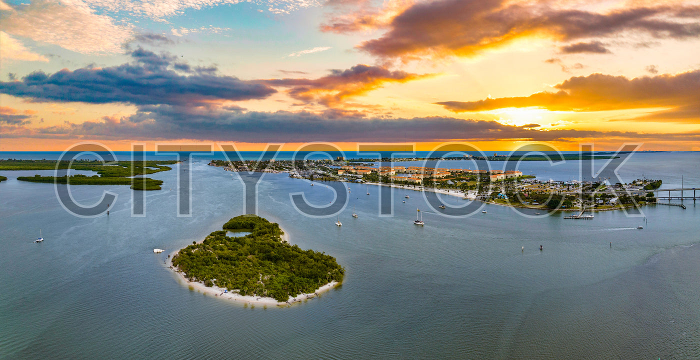 Aerial view of sunset over Fort Pierce Marina, Florida with boats