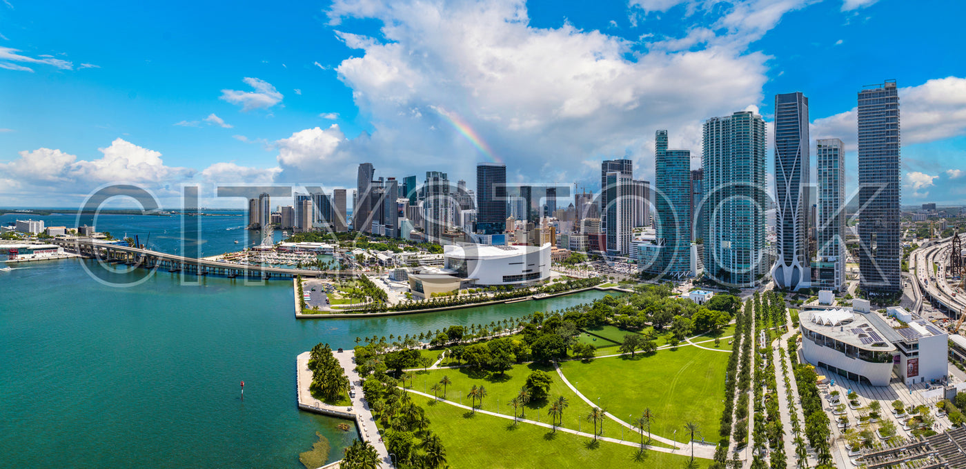 Aerial view of Miami skyline with a rainbow and Biscayne Bay