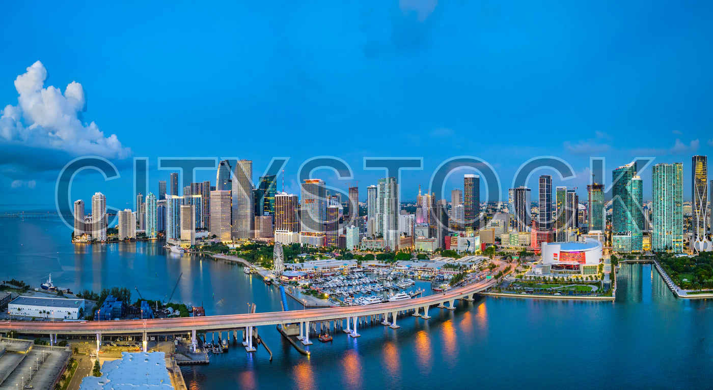 Panoramic view of Miami skyline and waterfront at dusk