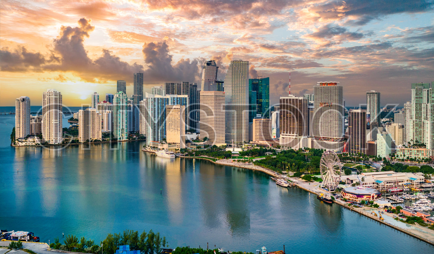 Sunset view of Miami skyline and waterfront with clouds