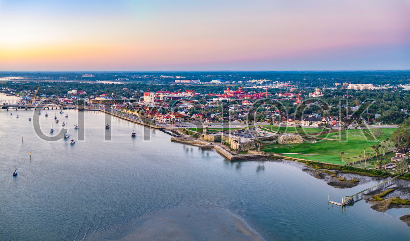 Aerial view of St. Augustine's historic waterfront at sunset