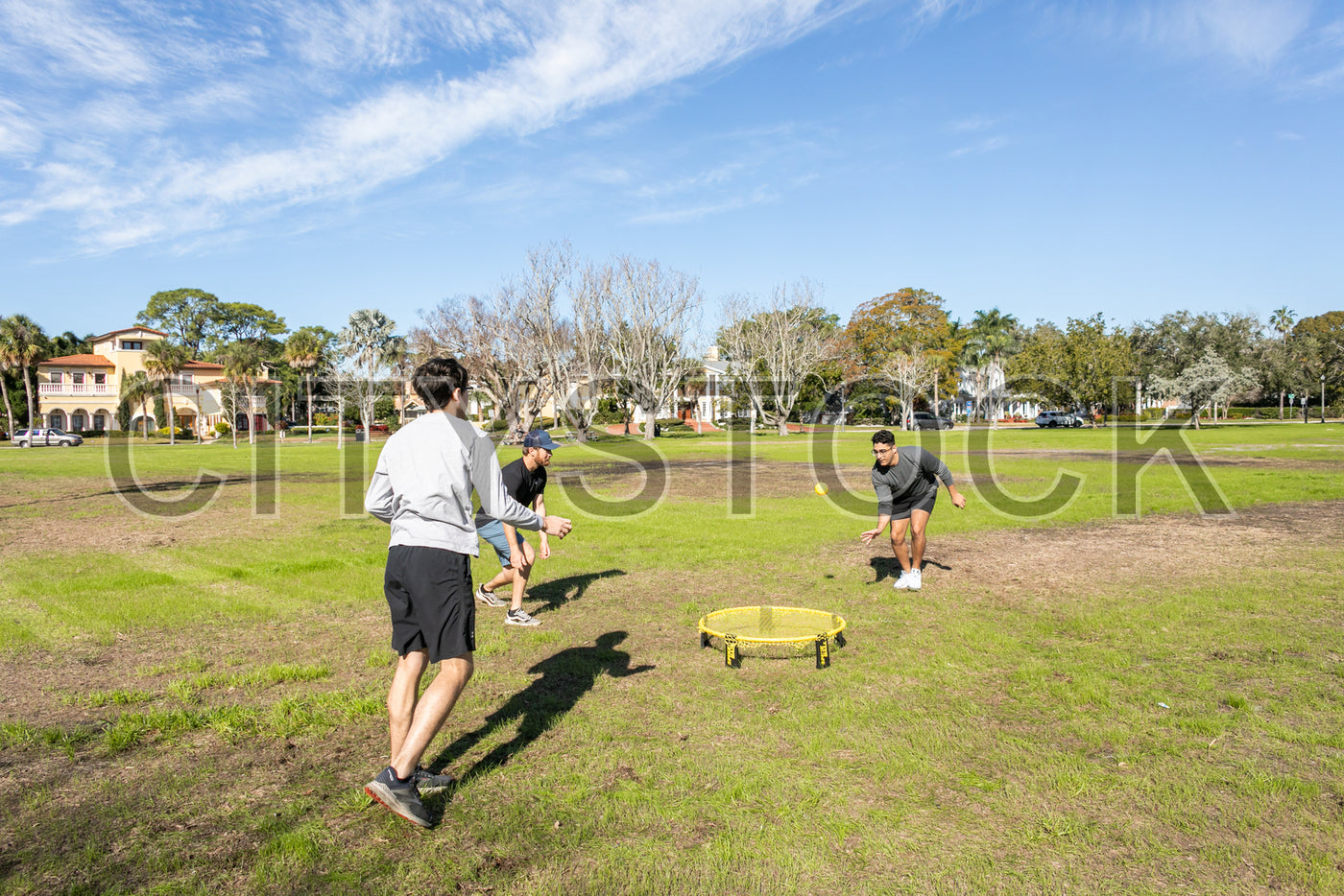 Friends playing an energetic team game in St Petersburg park