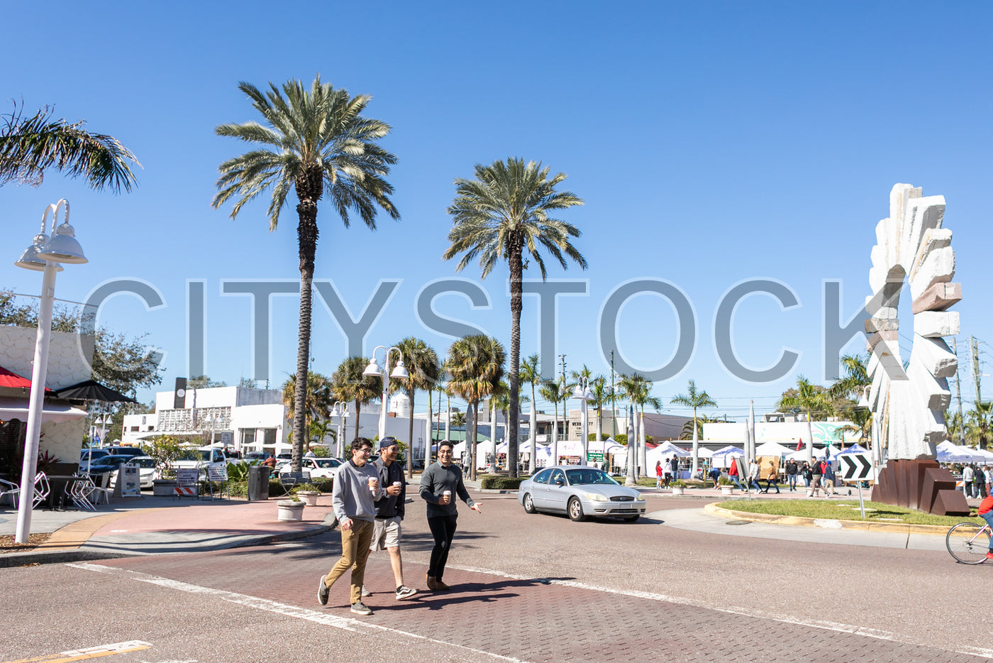 St Petersburg street scene with palm trees and locals