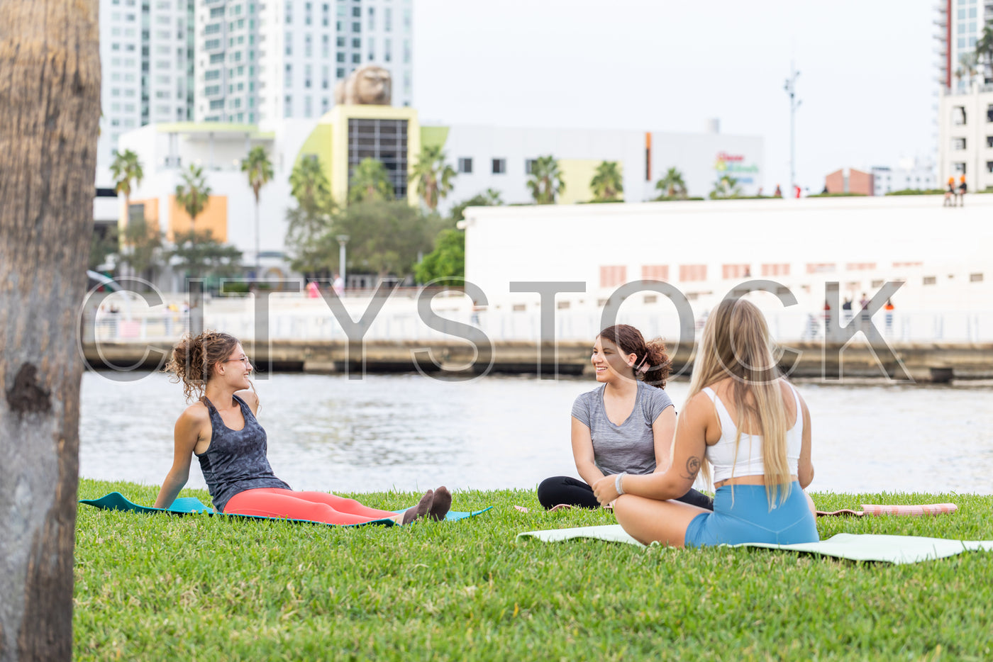 Outdoor yoga class with women in Tampa, Florida waterfront park