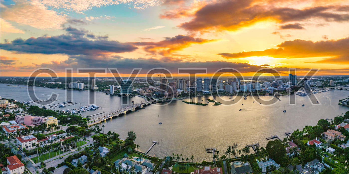 Aerial sunset view of West Palm Beach, waterfront and cityscape