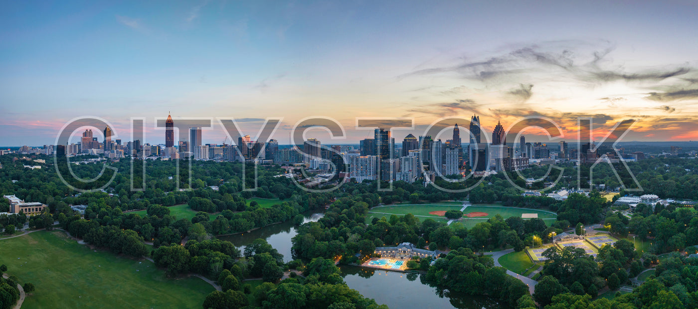 Aerial view of Atlanta skyline with parks at sunset