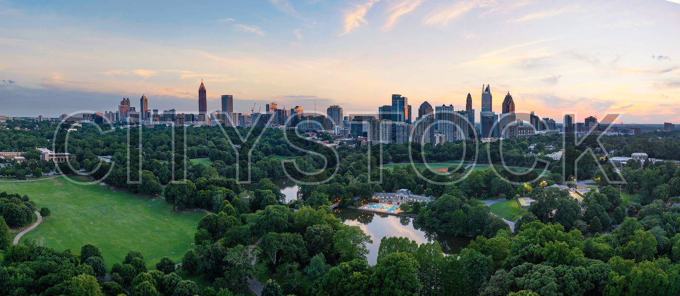 Aerial view of Atlanta skyline at sunset with Piedmont Park