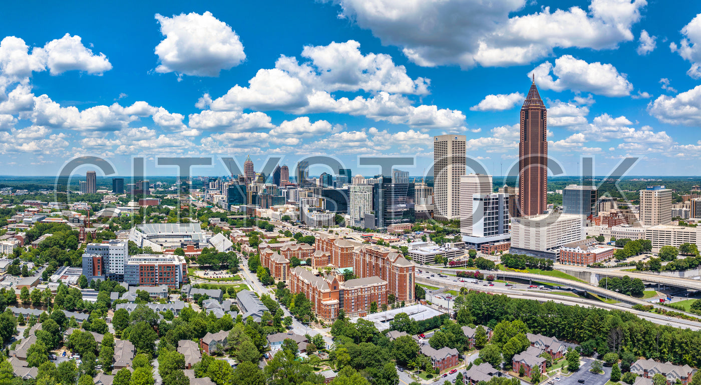 Aerial view of Atlanta skyline with skyscrapers and clouds