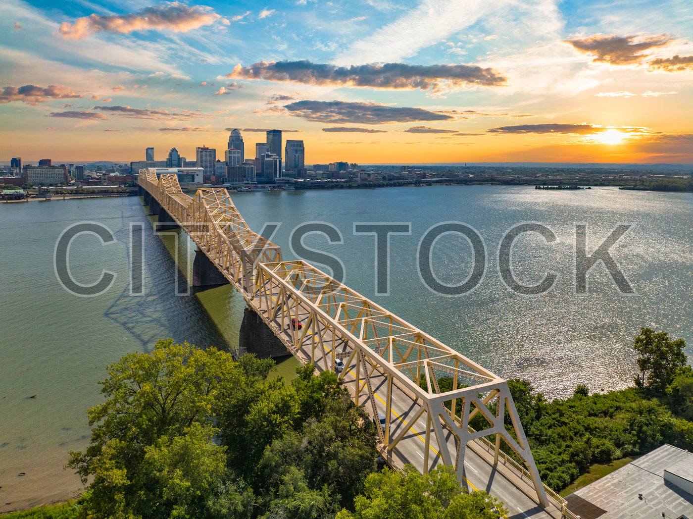 Aerial view of Louisville skyline and Ohio River at sunset