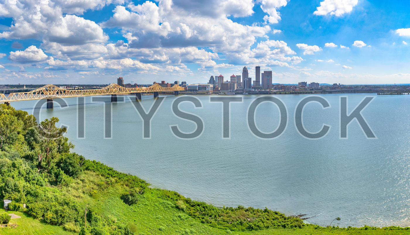 Breathtaking view of Louisville skyline with George Rogers Clark Bridge over Ohio River