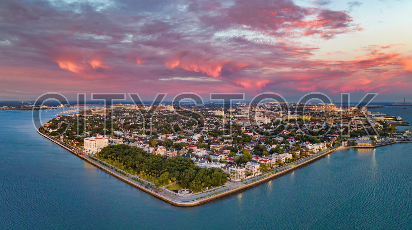 Aerial view of historic Charleston, SC at sunset with vibrant skies
