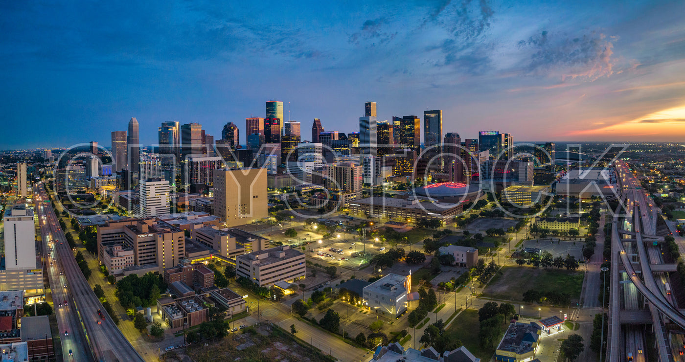 Aerial view of Houston skyline at twilight with city lights