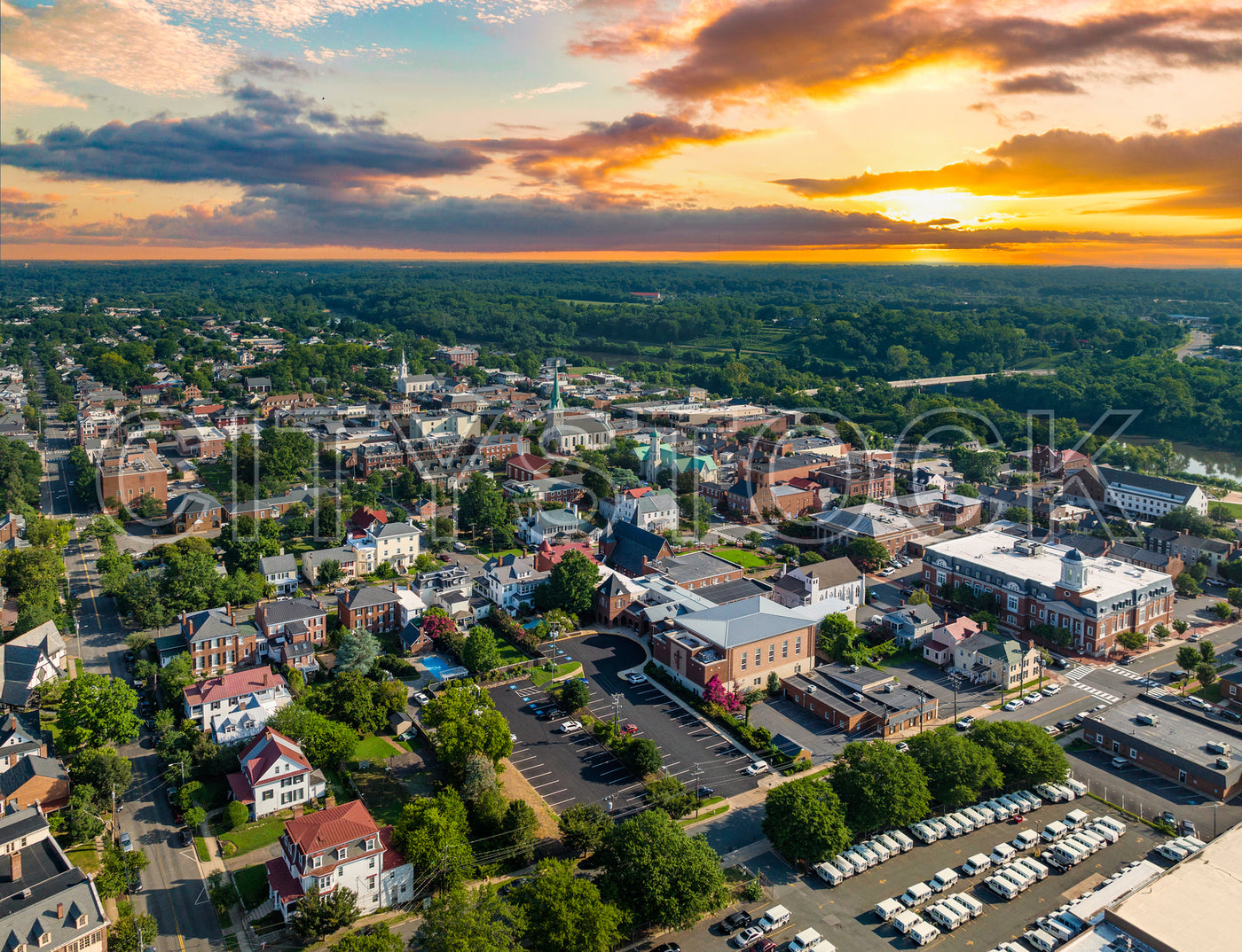 Aerial view of Fredericksburg, VA at sunset with river view
