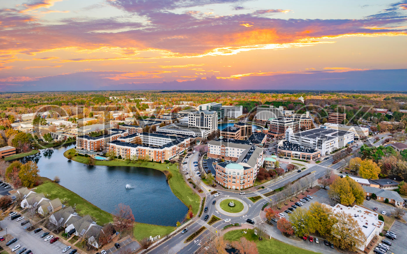 Aerial sunset view over Newport News, Virginia, showcasing urban and natural beauty