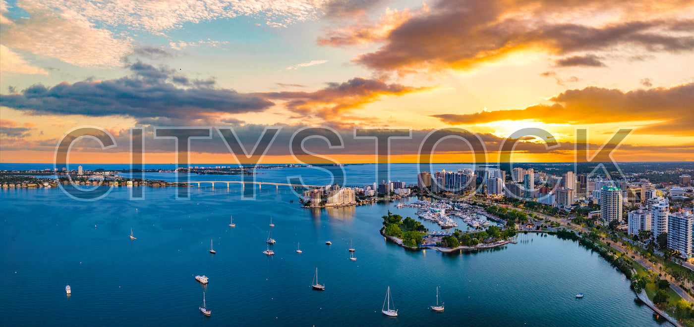 Aerial view of Sarasota skyline and marina at sunset in Florida