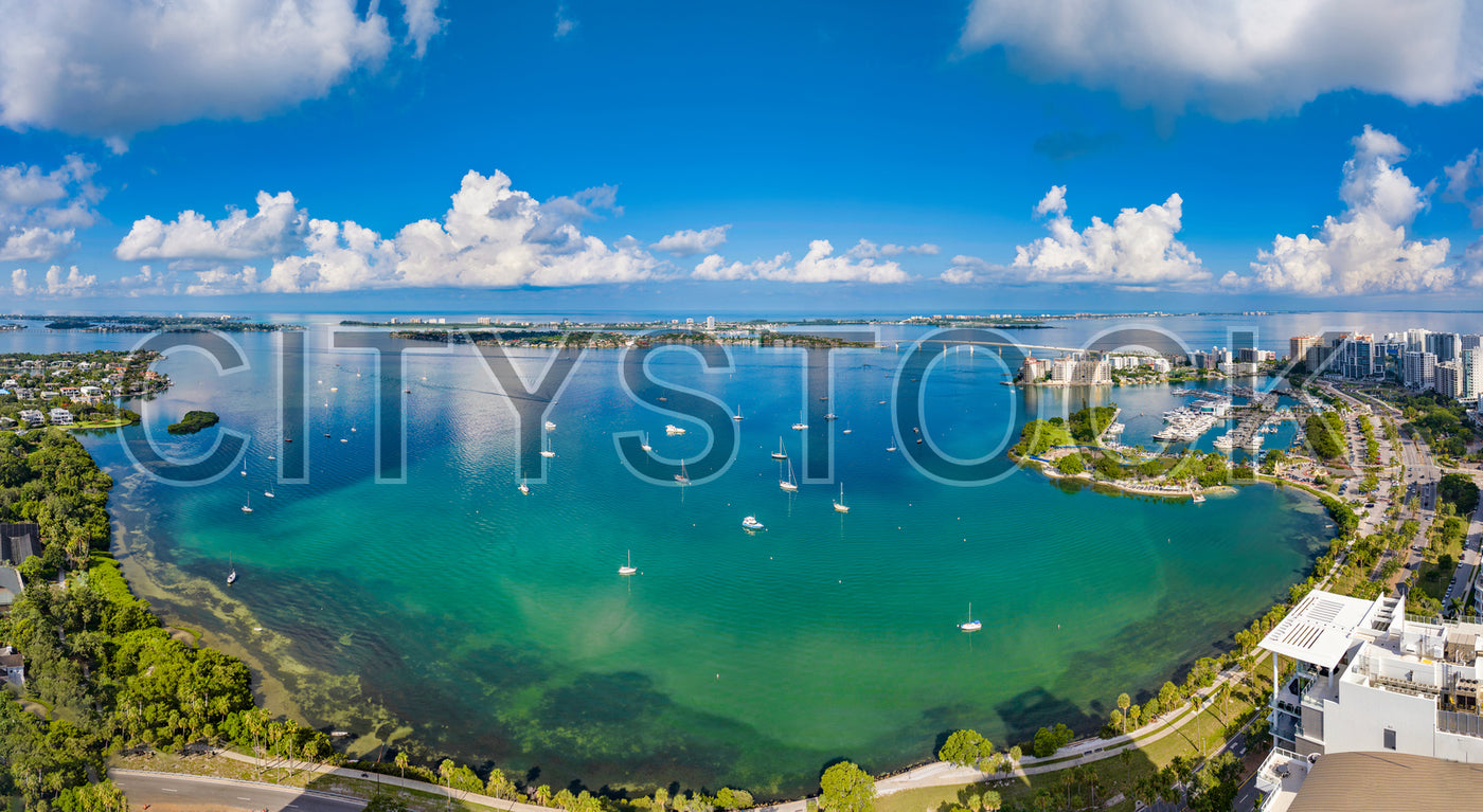 Aerial view of Sarasota, Florida showing skyline and bay with boats