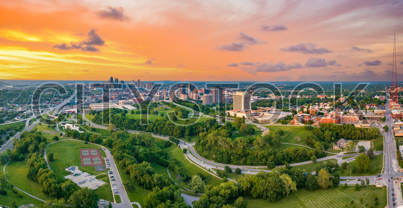Aerial sunset view of Kansas City skyline and roads in Missouri