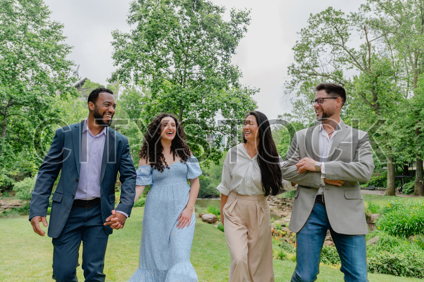 Diverse friends laughing together in Greenville park, SC