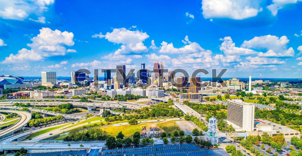 Aerial view of Atlanta downtown skyline and highways on a sunny day