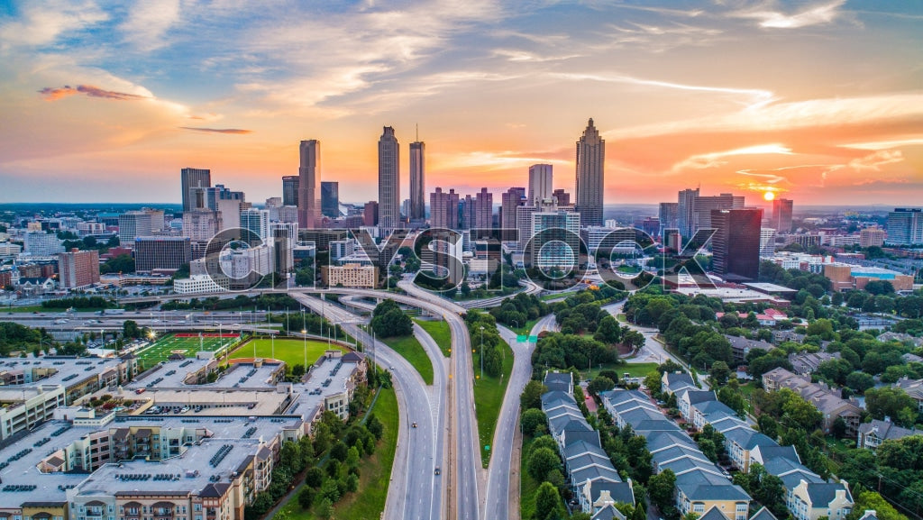 Stunning aerial sunrise view of Atlanta skyline with highways