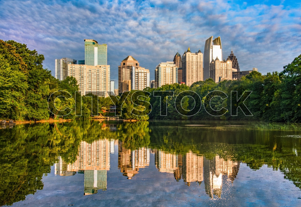 Atlanta cityscape and lake reflection at sunrise with high-rises