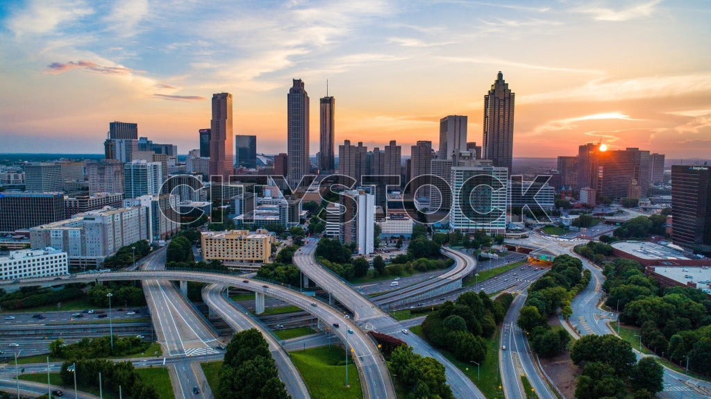 Stunning view of Atlanta skyline at sunset with busy highways