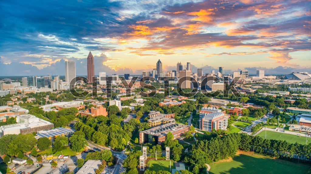Aerial view of Atlanta's skyline at sunset with vibrant colors