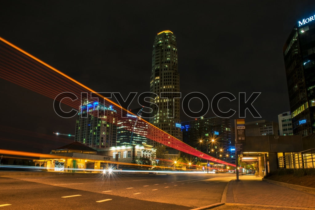 Atlanta cityscape at night with illuminated buildings and traffic
