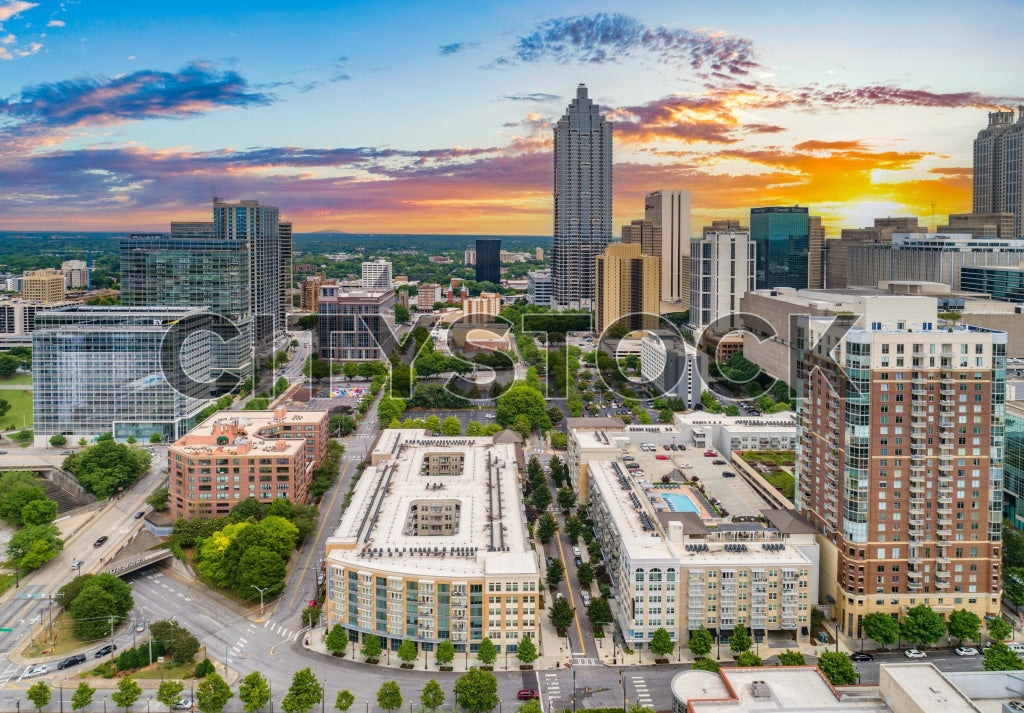 Aerial view of Atlanta skyline with sunset and colorful clouds