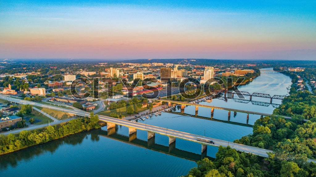 Aerial sunset view of Augusta skyline along Savannah River