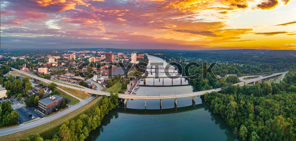Aerial cityscape of Augusta, Georgia, at sunset with river view