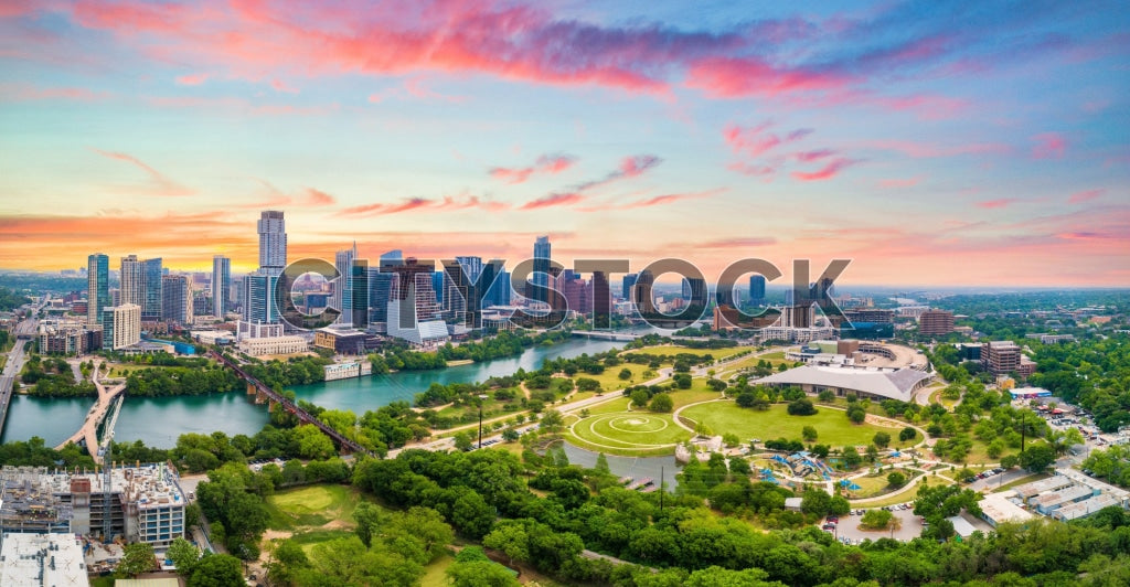 Austin skyline and Colorado River at sunrise, including Frost Bank Tower