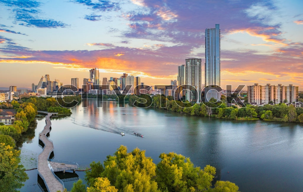 Aerial view of Austin skyline and Lady Bird Lake at sunrise