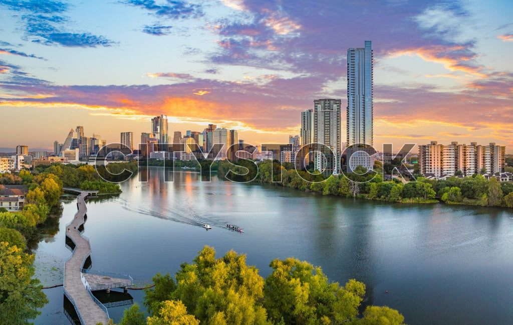 Aerial view of Austin skyline and Lady Bird Lake at sunrise