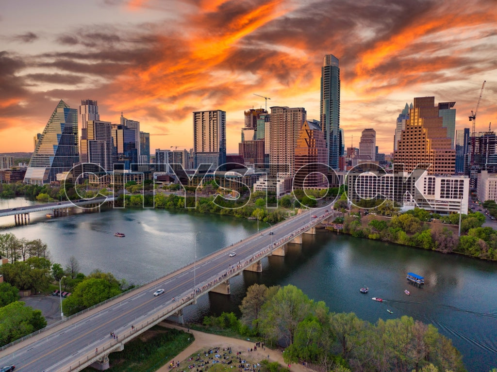 Aerial view of Austin skyline and Lady Bird Lake at sunset