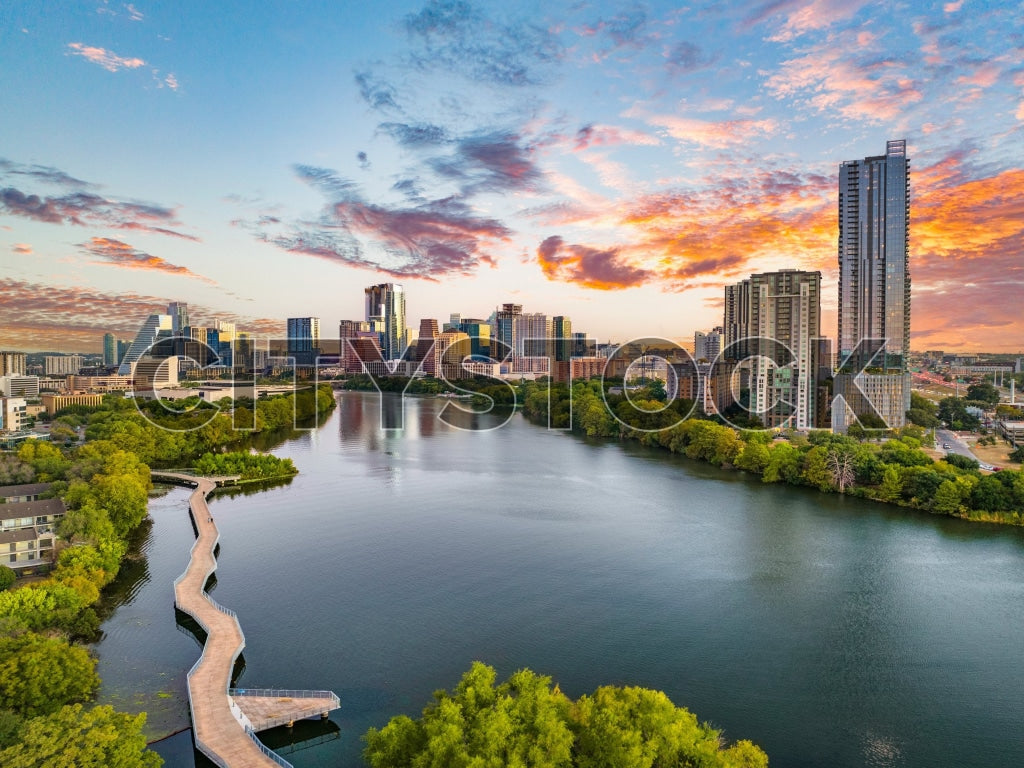 Austin skyline and boardwalk under sunrise colors