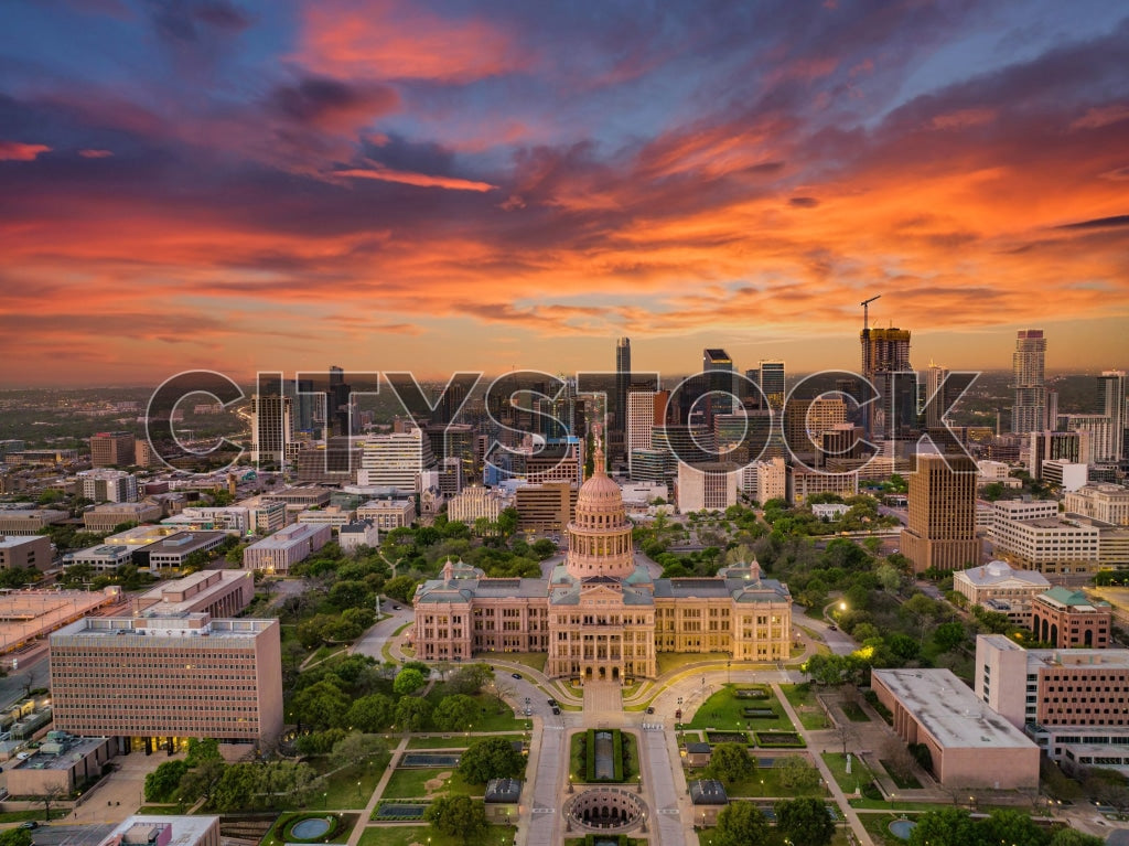 Austin, TX skyline and State Capitol building at sunset