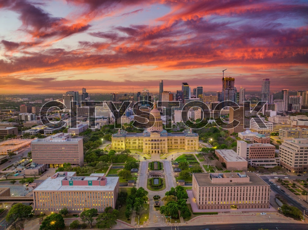 Austin skyline at sunset with pink and orange clouds