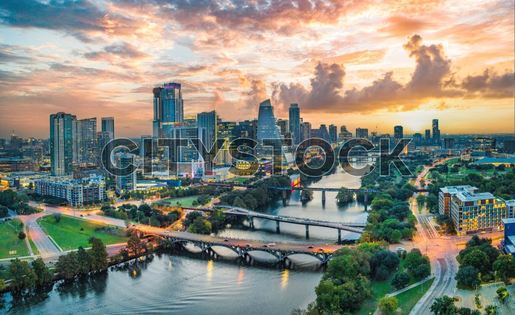 Aerial view of Austin skyline at sunrise with Colorado River